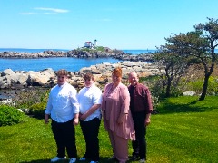 The Fleming family: Sons Justin and Ryan with Sandy & Mark in York, Maine for Mark’s younger sister’s wedding at the famed Nubble Lighthouse.